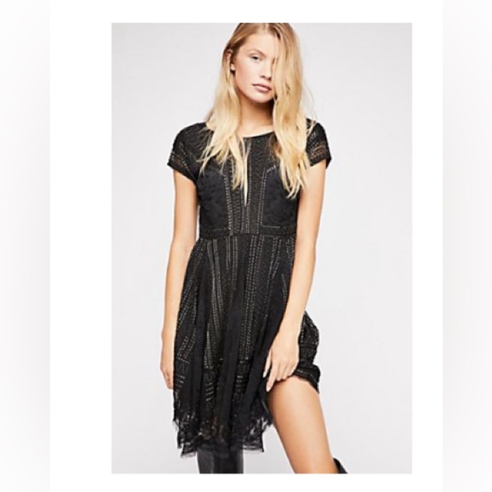 Gorgeous Free People Beaded mini dress.
